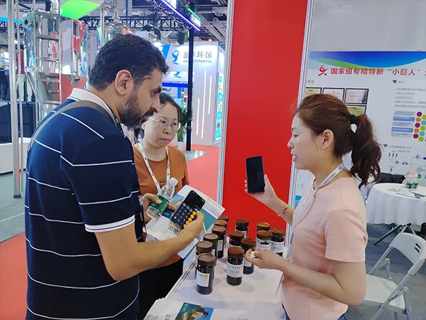 Sales staff assisting existing customers in learning about new products of interest
