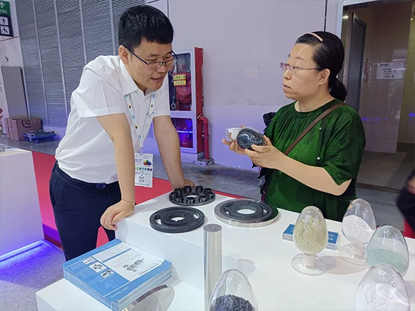 Sales staff discussing new products with staff