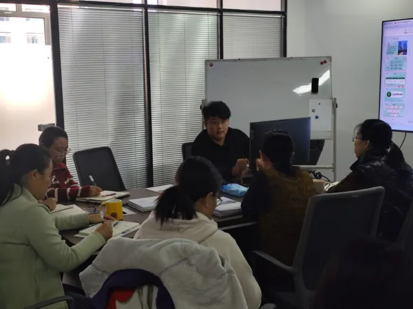 Antiscalant training team members diligently take notes.