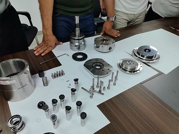 Customer is learning about the various components of the high-pressure pump.