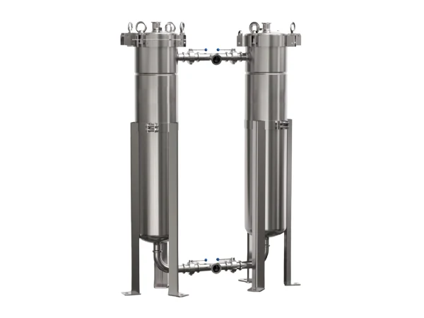 A duplex side entry bag filter housing on a gray background