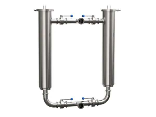 A duplex tube filter housing on a gray background