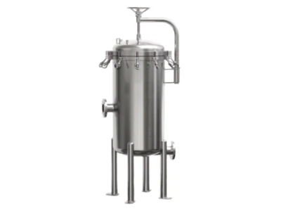 An industrial precision liquid filter housing on a gray background