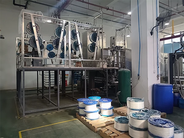 The mechanical equipment are producing membrane fibers.