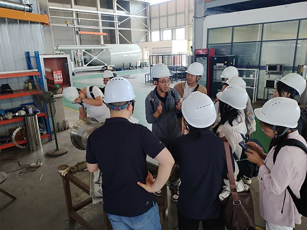 Technicians are explaining product details to the Sales team.