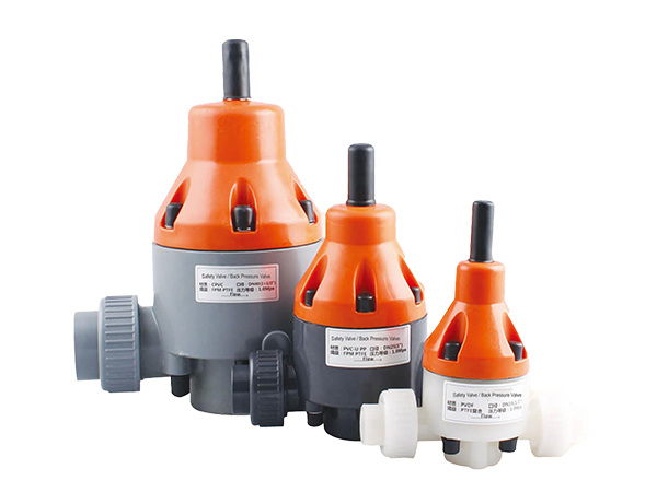 Three 186 type safety valve / back pressure valve on white background.