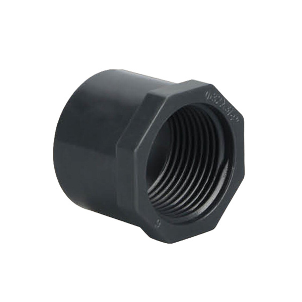 Plastic female thread bushing on white background.