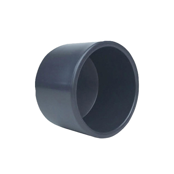 Plastic pipe cap on white background.