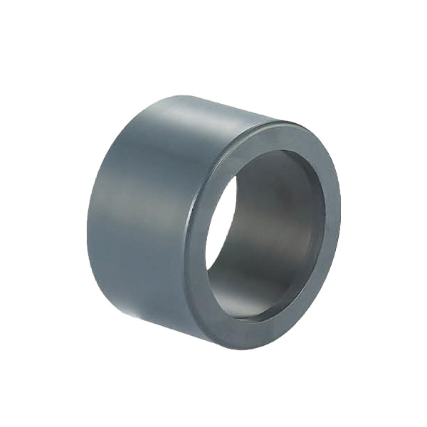 Plastic reducer bushing on white background.