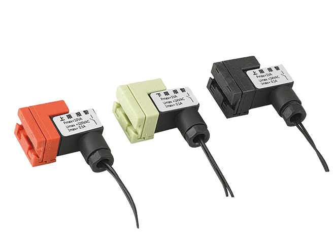 Three different types of Flow Alarm Switch.