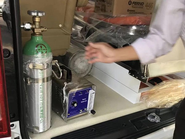 A portable ozone generator installed in a car.