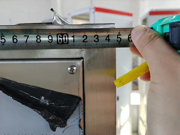 The staff is determining equipment cabinet dimensions.