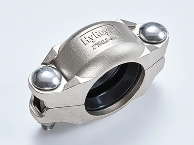 A piece of S80 stainless steel flexible grooved coupling on white background