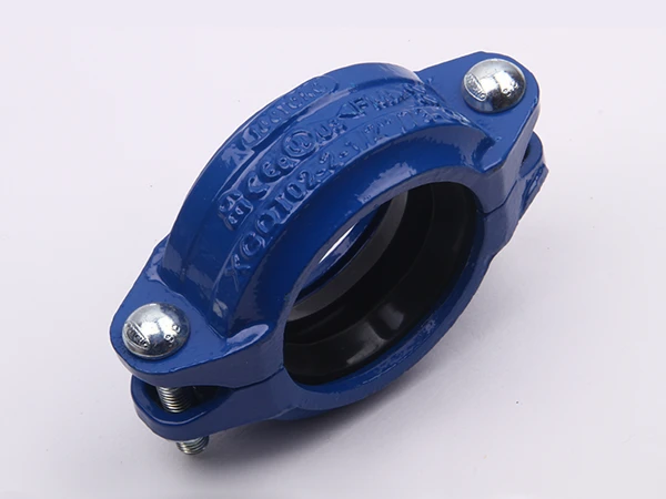 A piece of C ductile iron flexible grooved coupling on white background