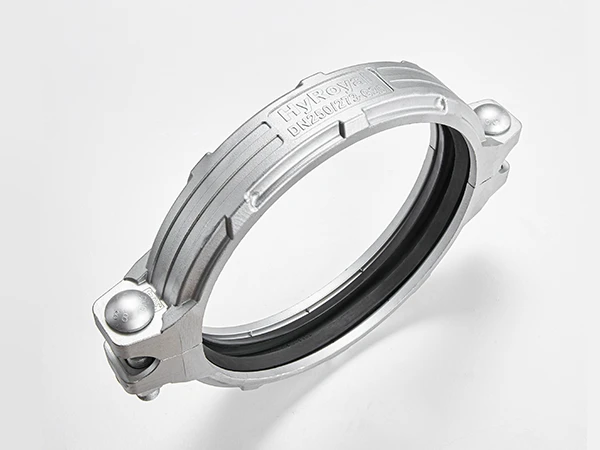 A piece of g30 stainless steel rigid grooved coupling on white background