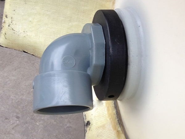 Assemble the outer pipe components and tank port thread.